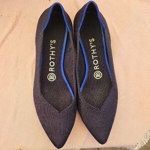 Rothy's Black Flats with Vibrant Blue Accents